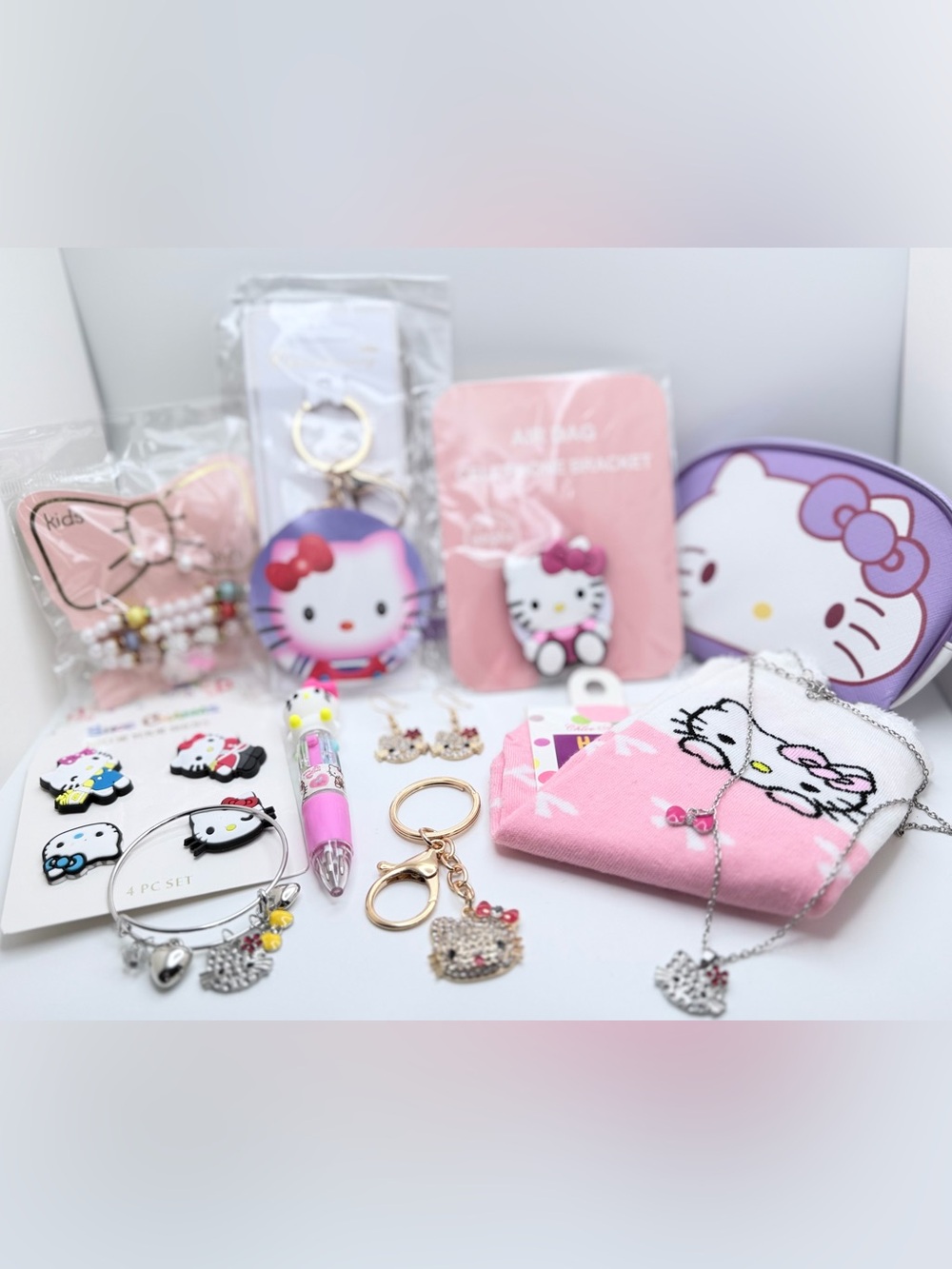 18-Piece Hello Kitty Accessory Bundle – Keychains, Jewelry, Socks, Hair
